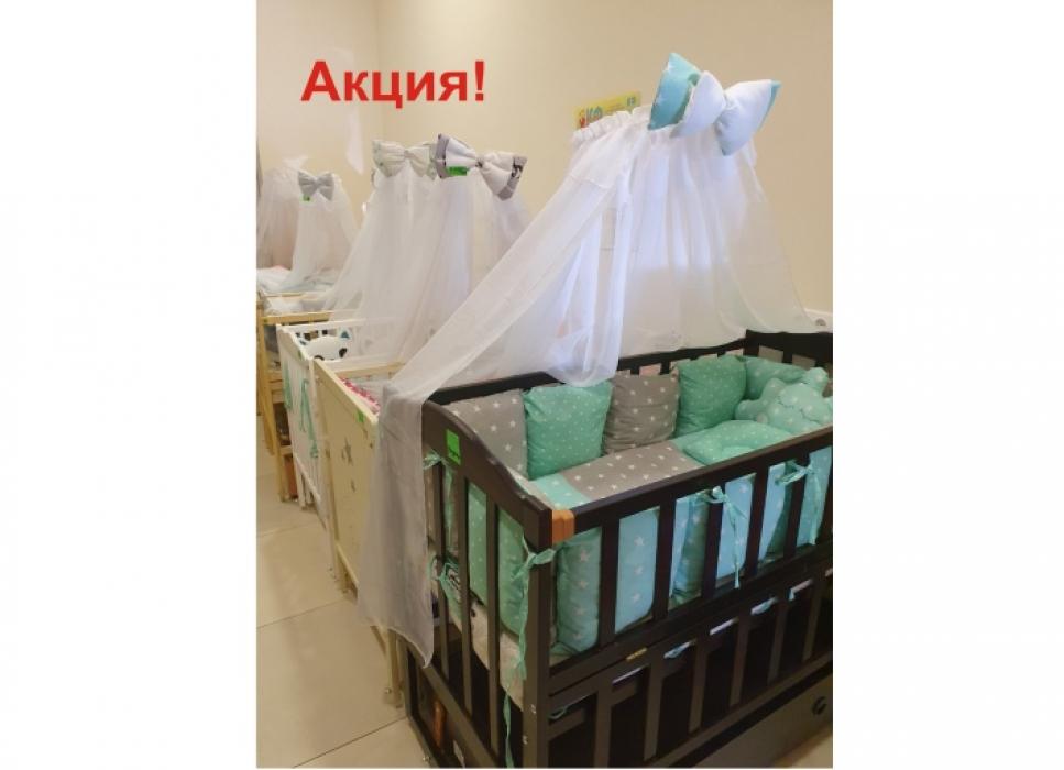 Ліжечка для новонароджених в магазині дитячих товарів «КАРАПУЗ»