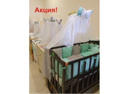 Ліжечка для новонароджених в магазині дитячих товарів «КАРАПУЗ»